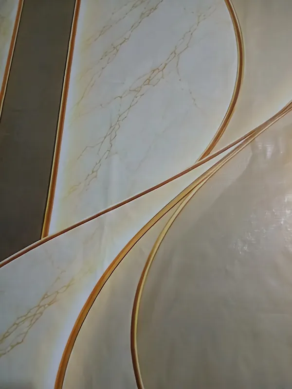 Close-up of a flex printed with a white and gold marble pattern
